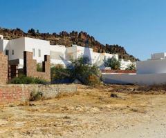 Terrain à Hammamet entouré par des villas et maisons d'hôtes